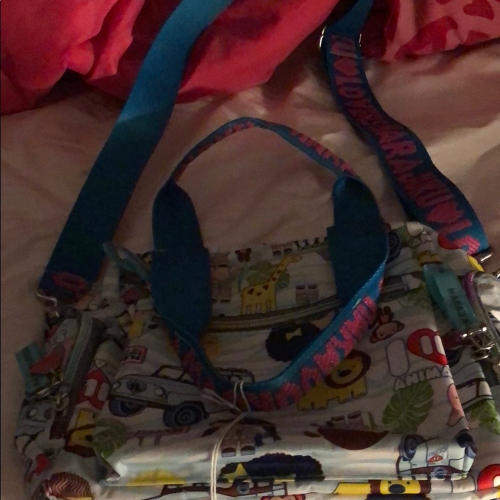 A harajuku lovers crossbody purse.